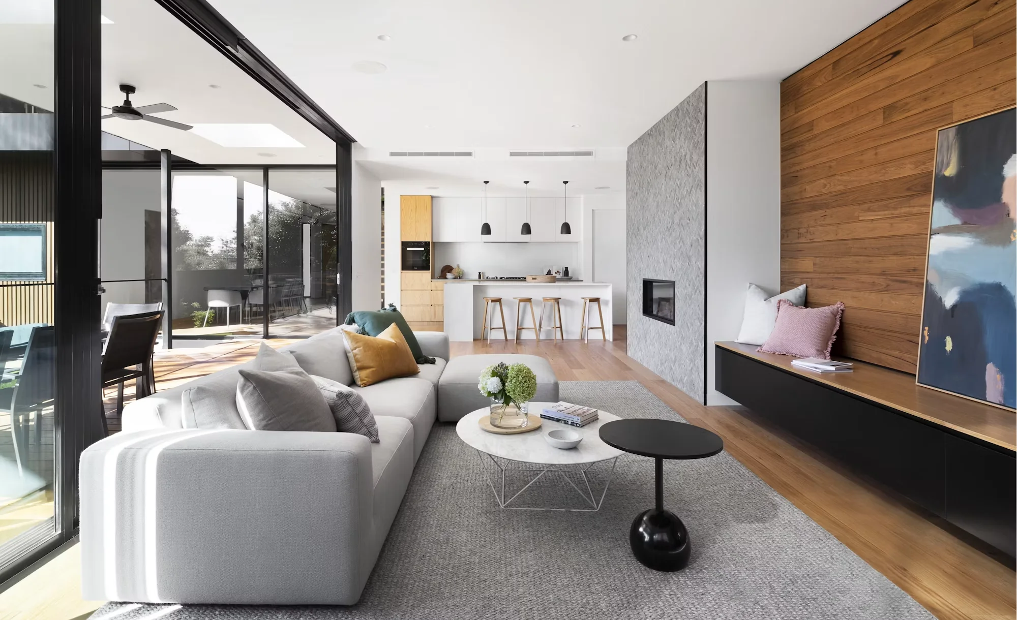 An open-plan living room in a contemporary UAE residence